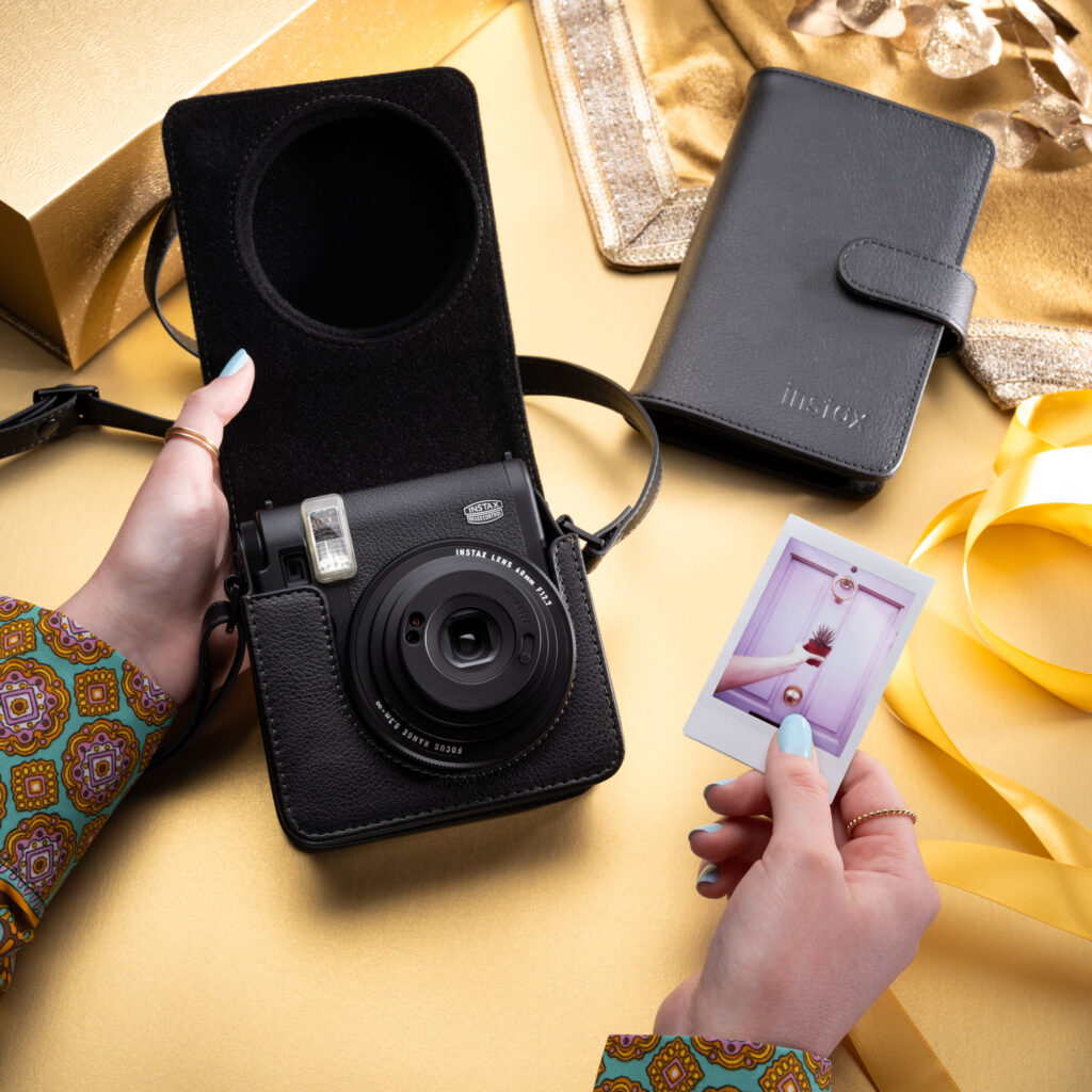 Your phone stays in your pocket. Your instax™ camera goes to the gig.