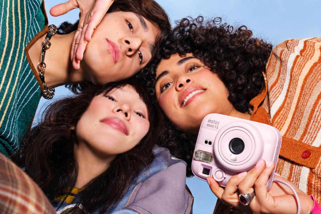 Bring a friend to the instax mini 13™ camera launch popup