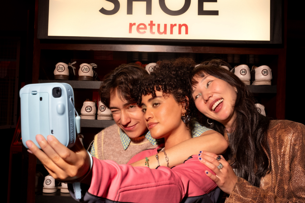 Bring a friend to the instax mini 13™ camera launch popup