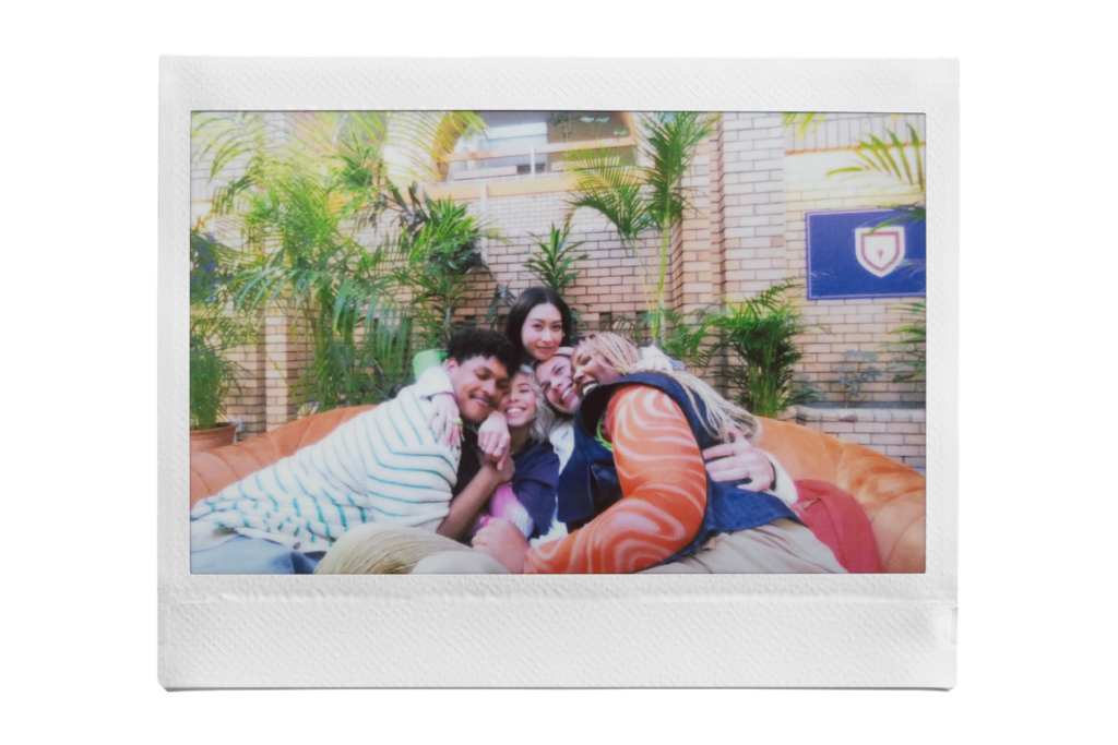 instax™ WIDE print of a group of friends hugging